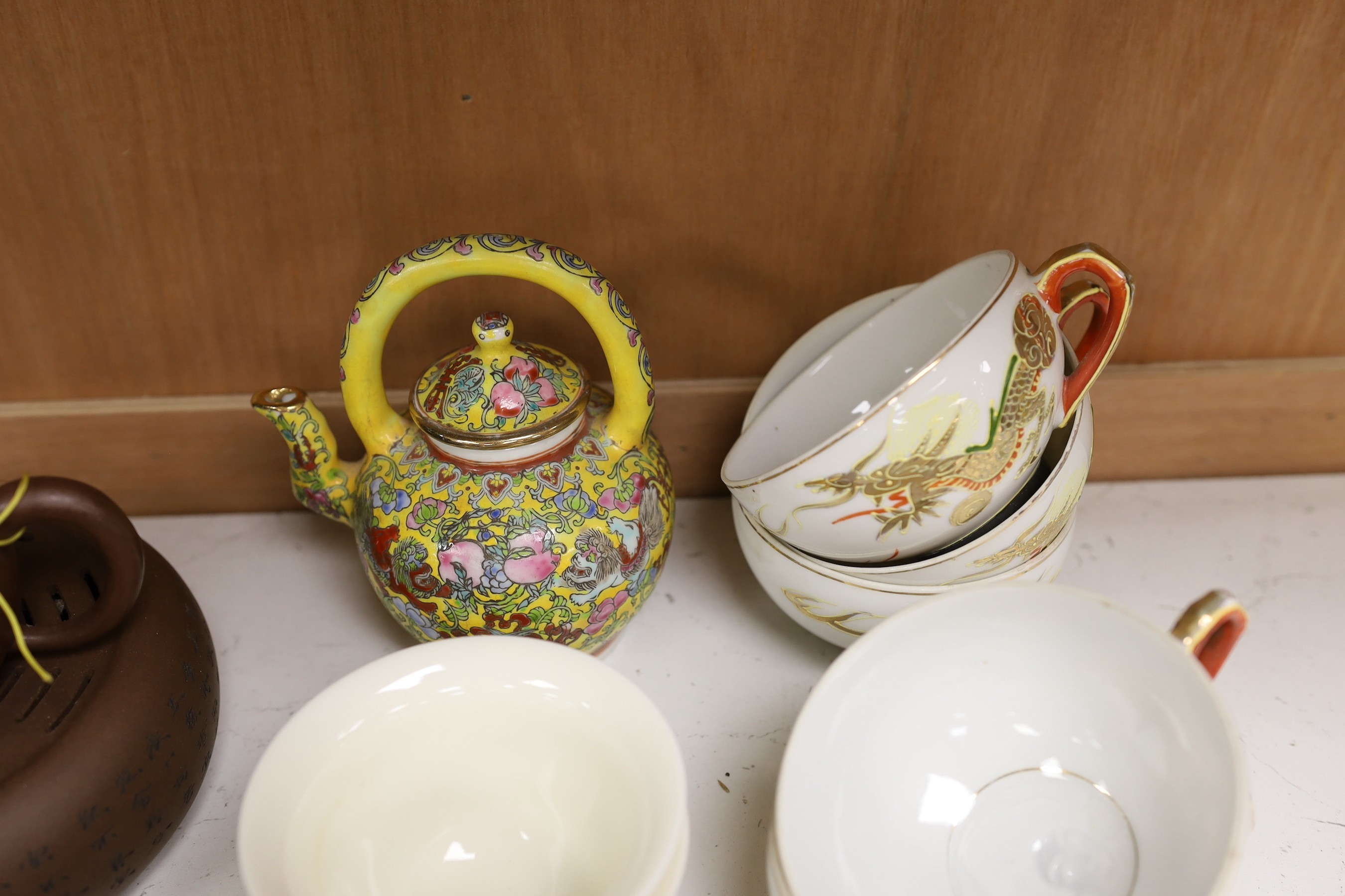 Six assorted Chinese teapots, one with stand and mixed ceramics